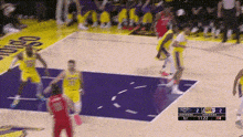 a basketball game is being played on a court with a score of 2 to 2
