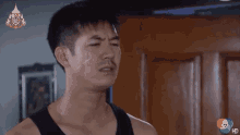a man with tears running down his face is on a tv screen that says 7 hd
