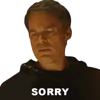 a man in a black jacket says sorry