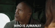 a man is talking to a woman in a car and asking who is jumanji ?