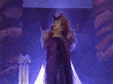 a woman with red hair is wearing a leopard print costume