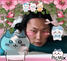 a picture of a woman with a cat on her head and flowers behind her