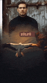 a man in a black turtleneck stands in front of a bird with the word zulfu on the bottom right