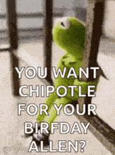 kermit the frog is sitting on a railing holding a chipotle for your birthday allen .