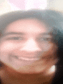 a blurry picture of a woman with bunny ears