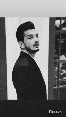 a black and white photo of a man with the words ham baap hai tumhare on the bottom