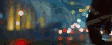 a blurry picture of a person 's face with a lot of lights behind them