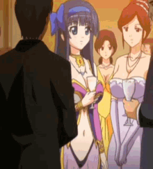 a group of anime girls are standing in a room with a man