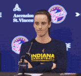 a girl wearing a blue indiana basketball shirt