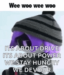 a person wearing a purple hat and a purple helmet is talking about driving .