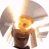 a man is laughing with a fireball coming out of his head