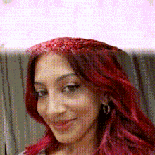 a close up of a woman with red hair