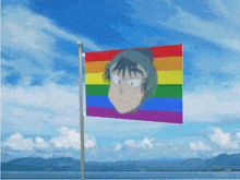 a rainbow flag with a picture of a person on it