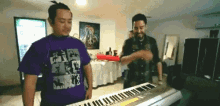 a man wearing a purple shirt that says jesus on it