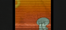 squidward from spongebob squarepants is standing in front of a wall and crying .