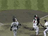 a baseball player wearing a number 12 jersey is being lifted by another player