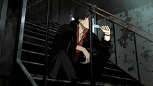 a man is sitting on a set of stairs holding a knife .
