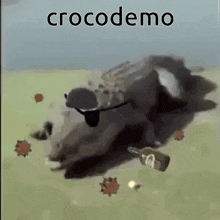 a picture of a cow laying on the ground with a bottle of alcohol next to it and the words crocodemo on the bottom