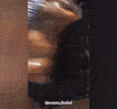 a blurred image of a person with the caption monyaa_ihecha