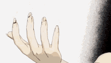 a close up of a person 's hand with a lot of rings on it .
