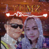 a picture of a man and a woman with yumz ever written on the top