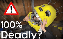 a man wearing a yellow smiley face helmet with a warning sign above it that says 100 % deadly