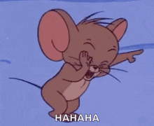 jerry the mouse from tom and jerry is laughing and pointing .