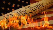 the united states flag is behind a burning copy of the united states constitution
