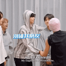 a group of young men are shaking hands and one says my english so bad you know