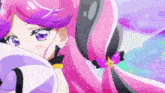 a close up of a girl with pink hair