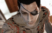 a close up of a man wearing sunglasses and a tattoo