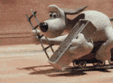 a cartoon dog is pushing a cart with a ladder