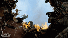 a movie poster for mission impossible 3 shows a man falling through a hole in a building