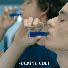 Drinking Blue Liquid Voyagers GIF - Drinking Blue Liquid Voyagers Blue Drink GIFs