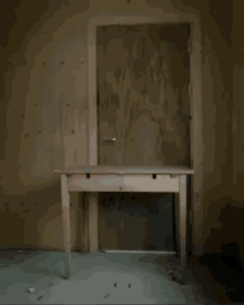 a table in a room with a door open