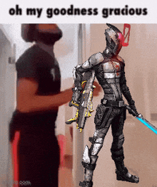 a man is standing in front of a robot holding a sword and a gun and says oh my goodness gracious