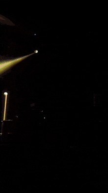 a blue background with a white light coming out of the middle