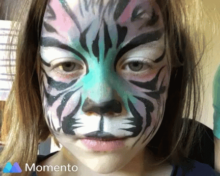 Girl wearing face paint Halloween!