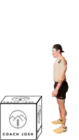 a shirtless man jumping over a box that says coach josh