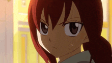 a close up of a girl with red hair and a ponytail