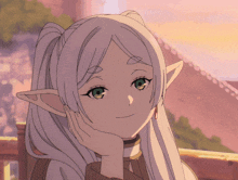a girl with white hair and green eyes is smiling