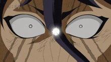 a close up of a person 's eyes with the time 9:09 on the bottom