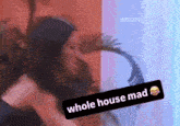 a picture of a woman with a sticker that says whole house mad