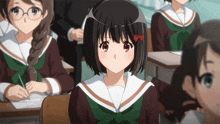 a girl with a red bow on her hair sits in a classroom