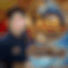 a blurry picture of a person 's face with a cartoon character in the background .
