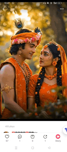 a man and a woman are standing next to each other in a forest .