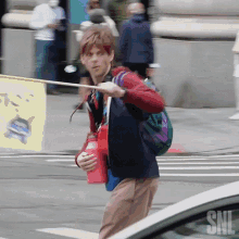 stopping traffic mikey day saturday night live running across the street crossing the street