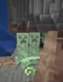 a creeper is sitting on a rock in a cave in minecraft .