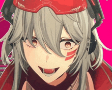 a close up of a girl 's face with a red hat on