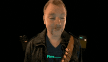 a man in a leather jacket says fine on a black background